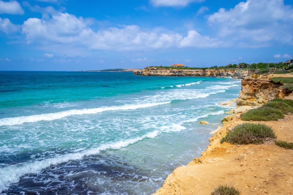 The beach of Is Benas, near the famous S’Arenas beach (pictured), has been designated clothing optional destination for two years. Gabriele Maltinti – stock.adobe.com