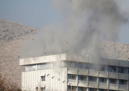 Smoke rises from the Intercontinental Hotel during an attack in Kabul, Afghanistan January 21, 2018. REUTERS/Mohammad Ismail