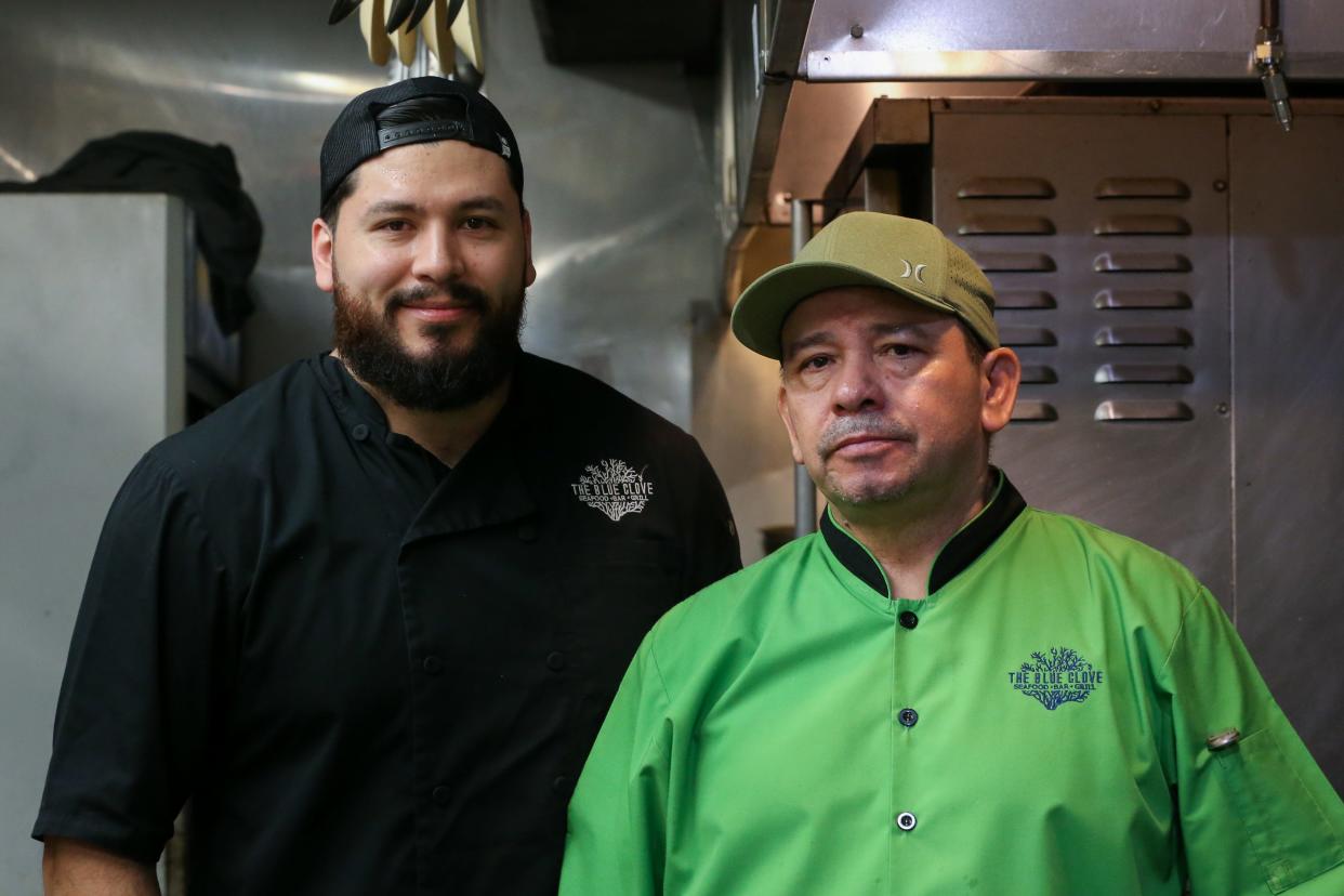 From left, owners Antonio "Tony" Posada Jr. and Antonio Posada stand in the kitchen at The Blue Clove Seafood Bar and Grill in The Market on Everhart Friday, May 3, 2024. The father and son duo won the Caller-Times Seafood Bracket Showdown and was voted the best seafood restaurant in Corpus Christi.