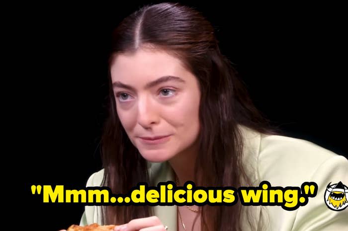 Lorde looking completely unbothered and saying, "mmm...delicious wing"