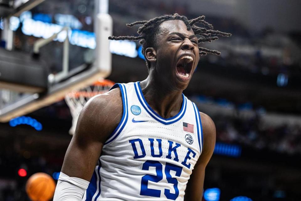 Duke forward Mark Mitchell (25) reacts to scoring a basket while getting fouled during an Elite Eight game between the Blue Devils and N.C. State in Dallas on March 31. Mitchell is one of the top players available in the NCAA transfer portal.