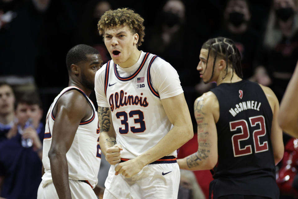 Illinois forward Coleman Hawkins (33) reacts during the second half of the team's NCAA college basketball game against Rutgers on Wednesday, Feb. 16, 2022, in Piscataway, N.J. (AP Photo/Adam Hunger)