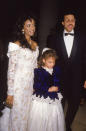 Looking like butter wouldn't melt, Nicole is seen here with her superstar father Lionel Richie and her mother Brenda dressed in a white dress and blue velvet jacket. Oh how we miss the 80s fashion.