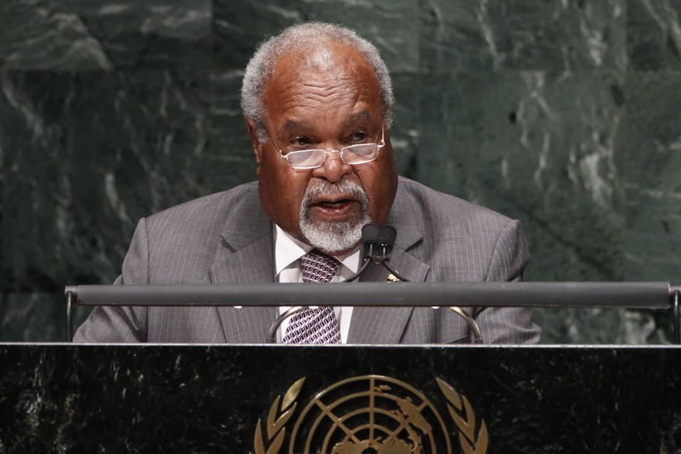 FILE - In this Sept. 27, 2010, file photo, Michael Somare, Prime then Minister of Papua New Guinea addresses the 65th session of the United Nations General Assembly at U.N. headquarters. Somare, a pivotal figure in Papua New Guinea’s independence and the South Pacific island nation's first prime minister, has died. He was 84. He died Friday, Feb. 26, 2021, after being diagnosed with a late-stage pancreatic cancer and admitted to a hospital on Feb. 19, his daughter Betha Somare said. (AP Photo/Seth Wenig, File)