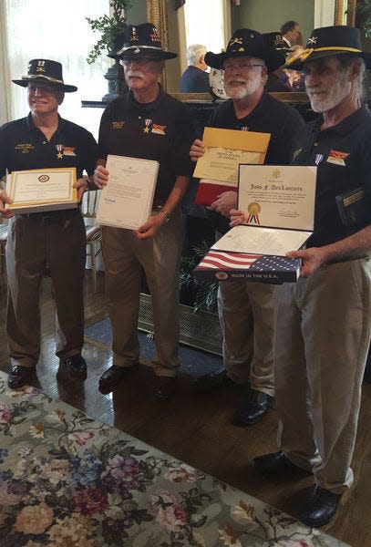 From left, Robert Frank, Robert Monette, Bruce Shearer and South Bend native John DesLauriers pose for photos in Little Rock, Ark., on April 18, 2017. All four men were awarded the Silver Star for their service in Vietnam. Photo provided