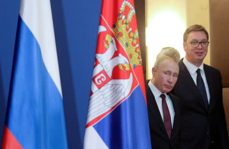 Russian President Vladimir Putin and Serbian President Aleksandar Vucic arrive for a news conference in Belgrade, Serbia, January 17, 2019. REUTERS/Stoyan Nenov