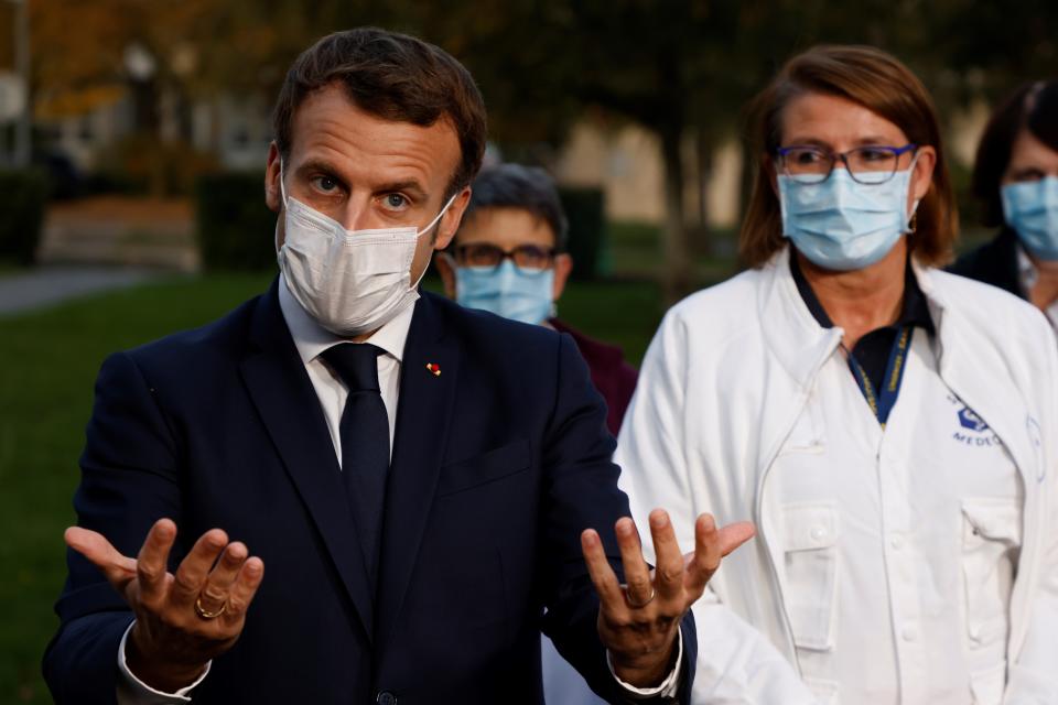 French President Emmanuel Macron speaks after meeting with the medical staff of the Rene Dubos hospital centre, in Pontoise, outside Paris. Photo: Ludovic Marin, Pool via AP