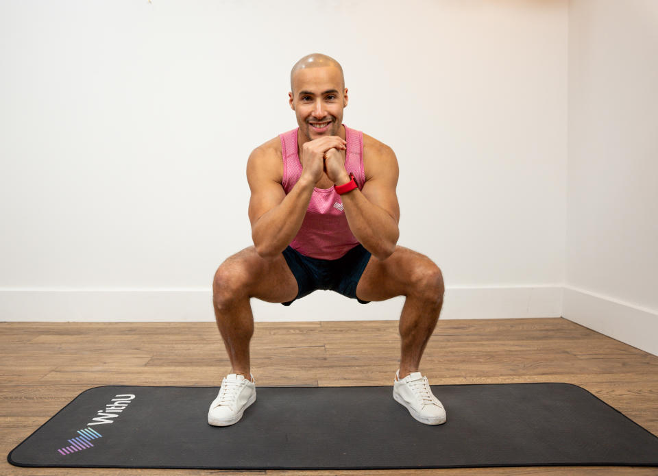 WithU trainer Omar Mansour performing a pulse squat