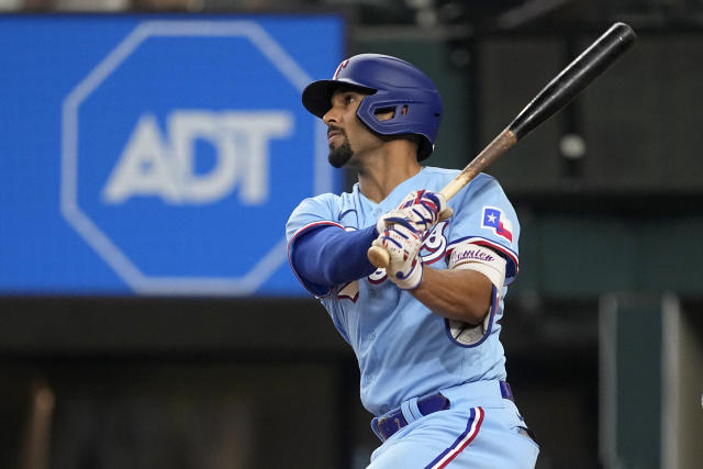 Texas Rangers' Corey Seager rounds the bases after hitting a home run  during a baseball game against the Seattle Mariners, Sunday, June 4, 2023,  in Arlington, Texas. (AP Photo/Tony Gutierrez Stock Photo 