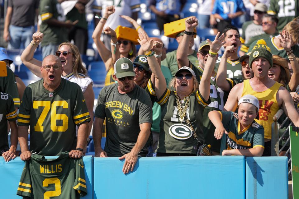 Green Bay Packers fans cheer after an NFL football game against the Tennessee Titans Sunday, Sept. 22, 2024, in Nashville, Tenn. (AP Photo/George Walker IV)