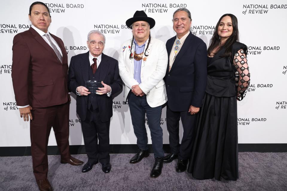 From left, William Belleau, Martin Scorsese, Yancey Red Corn, Talee Red Corn and Lily Gladstone pose with the Best Film award for "Killers of the Flower Moon" during the National Board Of Review 2024 Awards Gala at Cipriani 42nd Street on January 11, 2024 in New York City.