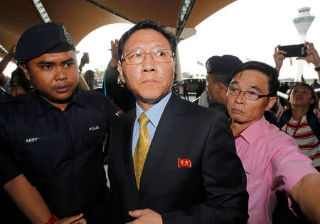 North Korean Ambassador to Malaysia Kang Chol (C), who was expelled from Malaysia, arrives at Kuala Lumpur International Airport in Sepang, Malaysia March 6, 2017. REUTERS/Lai Seng Sin