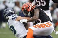Cincinnati Bengals' Dax Hill (23) is called for unnecessary roughness against Seattle Seahawks' Jake Bobo (19) during the second half of an NFL football game, Sunday, Oct. 15, 2023, in Cincinnati. (AP Photo/Michael Conroy)