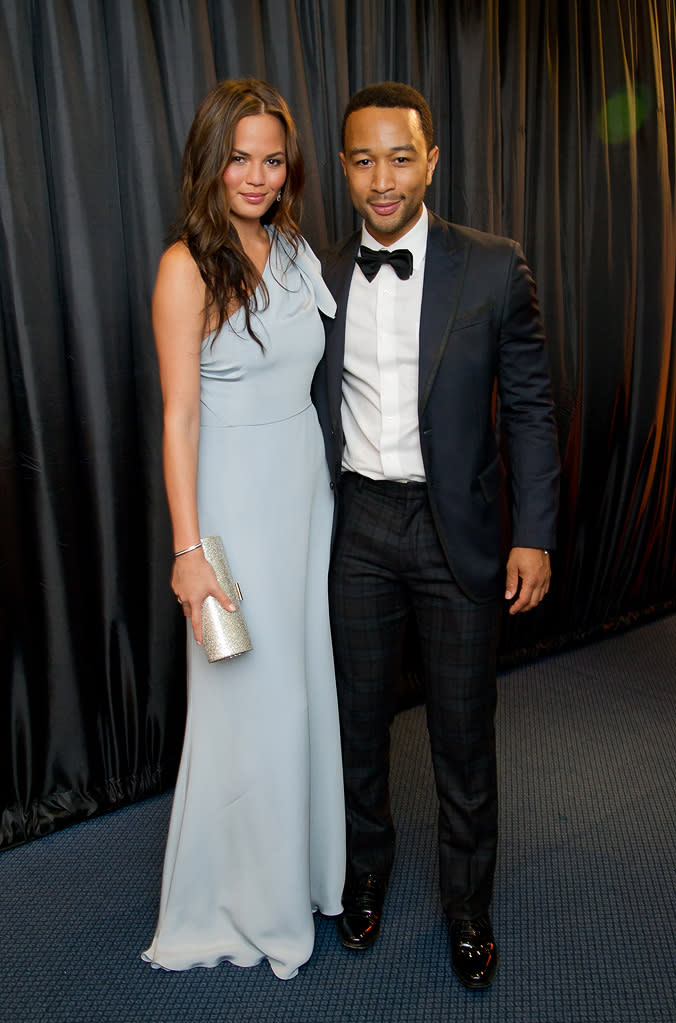 Musician John Legend joined Rosario in presenting Tommy Hilfiger with his award, so naturally he and his girlfriend, model Christine Teigen, also donned duds from the designer's collection. Nick Harvey/<a href="http://www.wireimage.com" rel="nofollow noopener" target="_blank" data-ylk="slk:WireImage.com;elm:context_link;itc:0;sec:content-canvas" class="link ">WireImage.com</a> - September 6, 2011