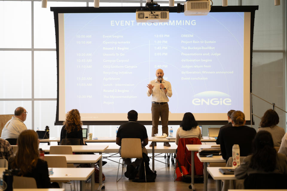 ENGIE Vice President of Major Partnerships Serdar Tufekci welcomes participants, judges, and spectators to the 2024 Smart Campus Challenge Judging Event at the newly built Energy Advancement and Innovation Center.