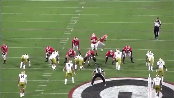 Beautiful job of Thomas passing off one rusher to handle the other on the stunt.