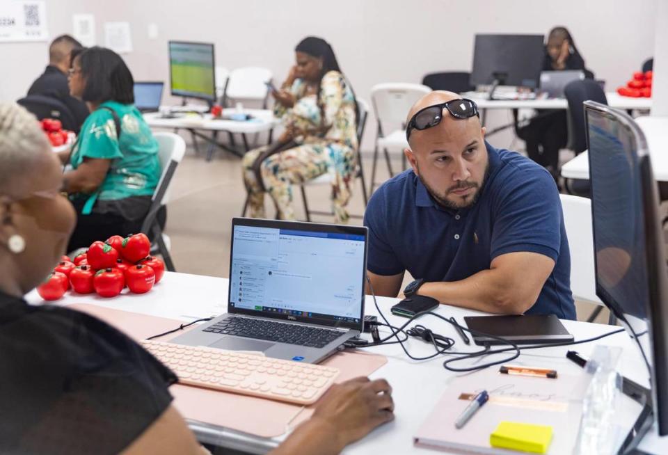 Diego Fernandez, 40, goes through the procedures to become a Miami-Dade Schools substitute teacher at the Kelly Education offices on Wednesday, Oct. 4, 2023, in Miami, Fla.