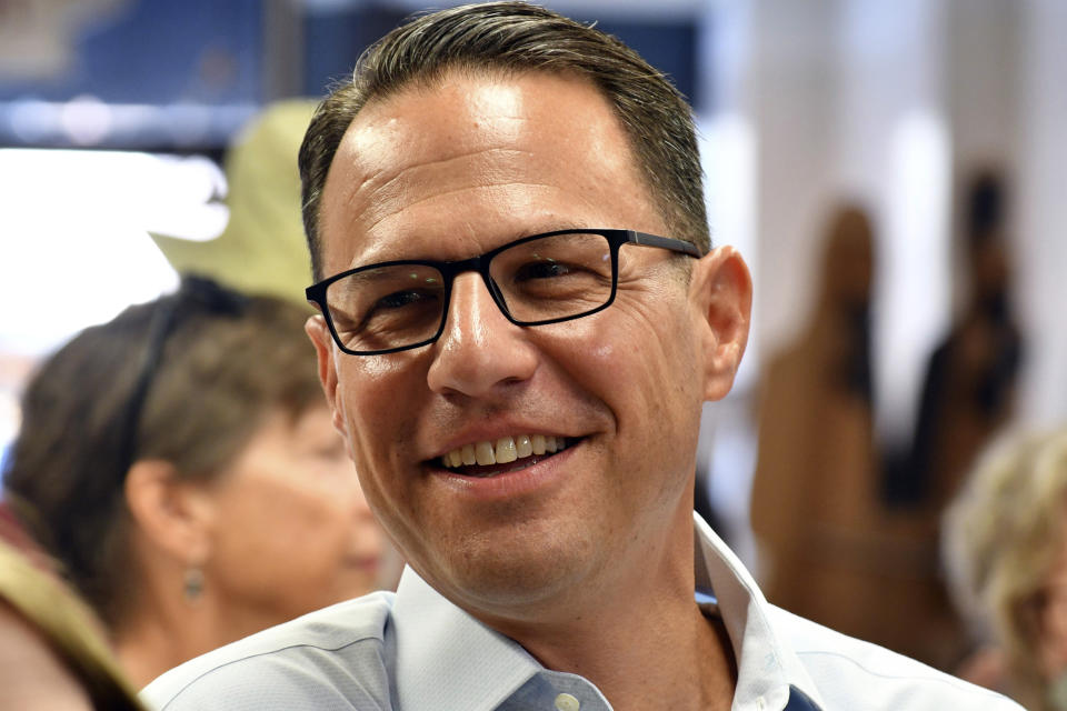 FILE - Josh Shapiro, Pennsylvania's Democratic nominee for governor, speaks to the crowd during a campaign event at Adams County Democratic Party headquarters, Sept. 17, 2022, in Gettysburg, Pa. Shapiro will be taking office as Pennsylvania's next governor in January 2023 after running a campaign in which he spoke early and often about his Jewish religious heritage. (AP Photo/Marc Levy, File)