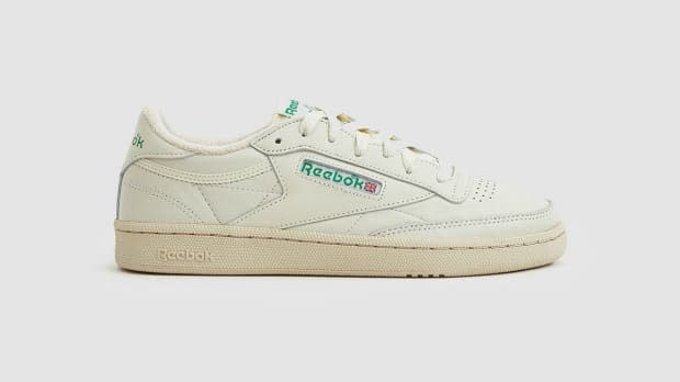 Reebok Club C 85 Sneaker in Chalk/Green, $75, <a href="https://rstyle.me/n/dfy2m8pprw" rel="nofollow noopener" target="_blank" data-ylk="slk:available here;elm:context_link;itc:0;sec:content-canvas" class="link ">available here</a>.