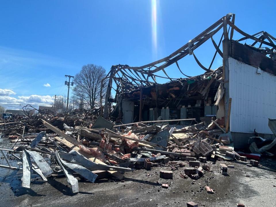 Rubble on the site of a structure fire at the Eddy Group head office in Bathurst.