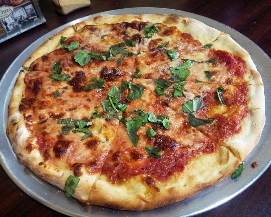 plain cheese round pizza at Di Fara in Brooklyn, NY