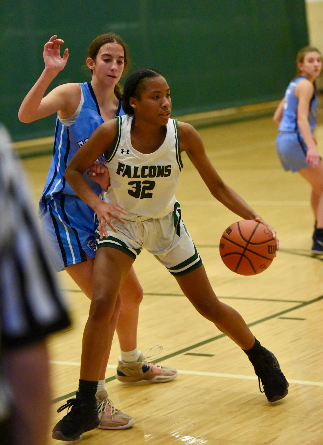 Birmingham Groves' Nevaeh Cochran-McKay passes during a non-conference girls basketball game Thursday, Dec. 8, 2022.