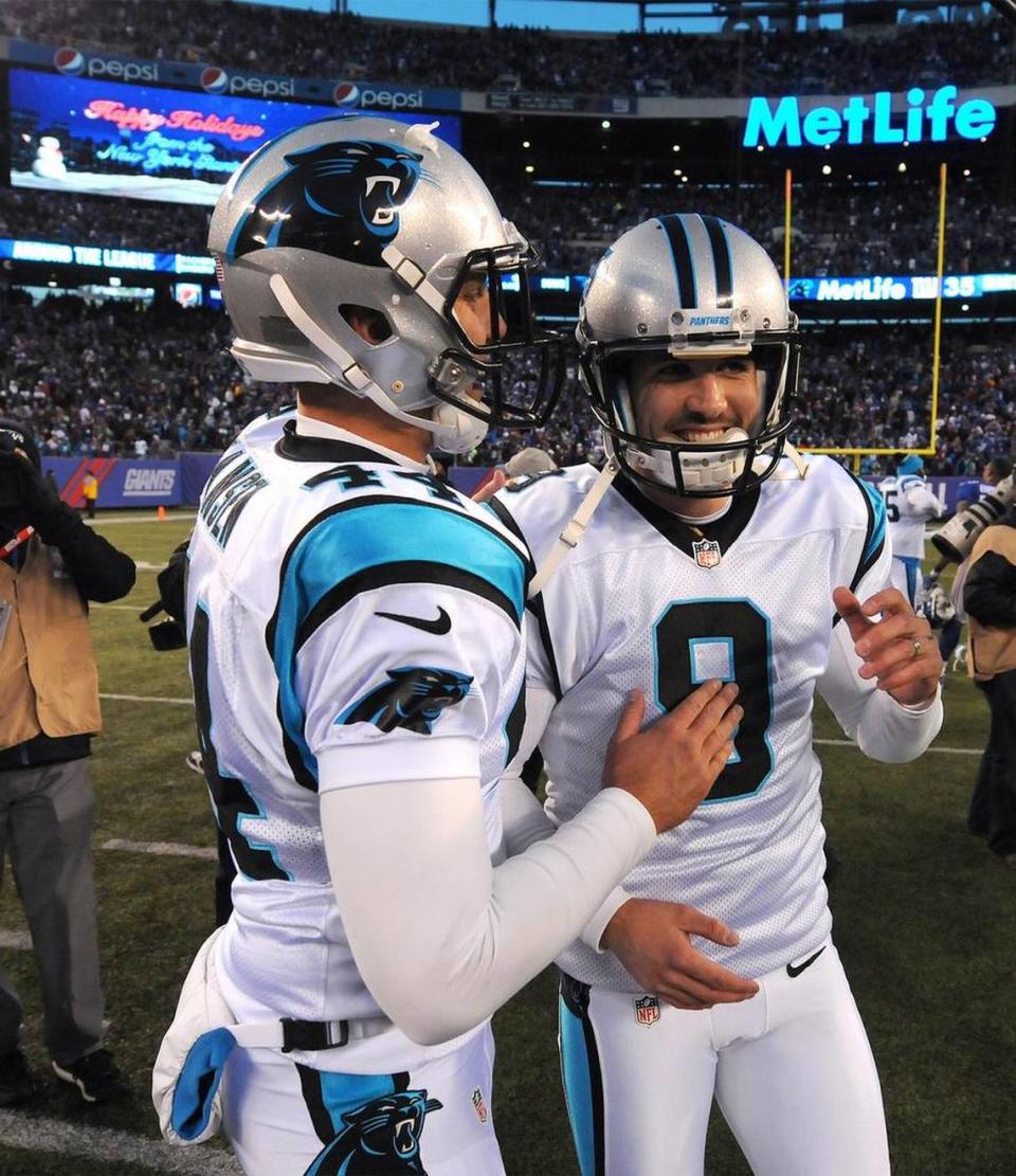 Carolina Panthers long snapper J.J. Jansen, left, congratulates kicker Graham Gano, right, following his game winning field goal kick vs the New York Giants at MetLife Stadium in East Rutherford, NJ on Sunday, December 20, 2015. The Panthers defeated the Giants 38-35.