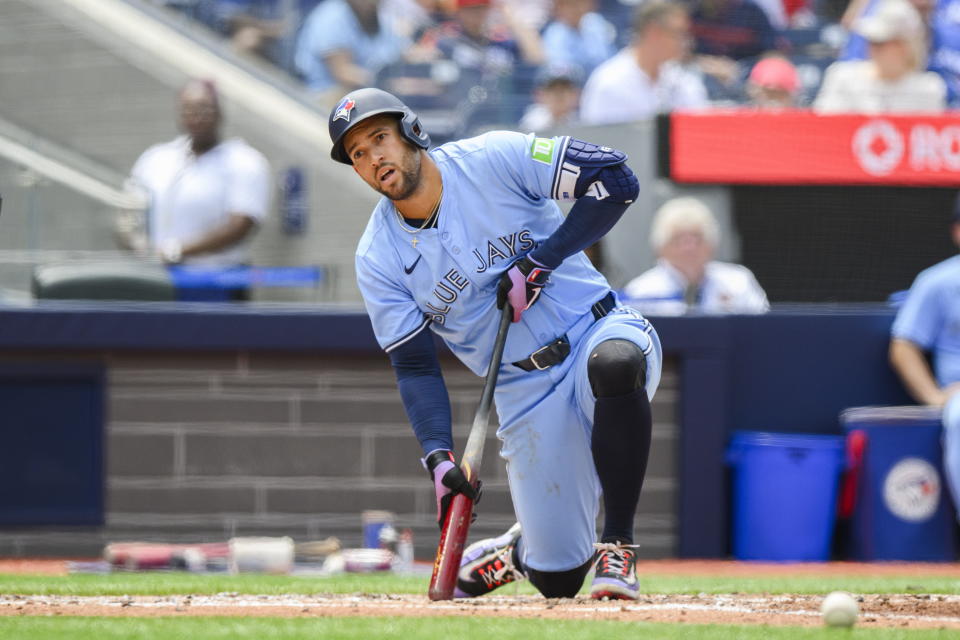 Toronto Blue Jays' George Springer looks on after swinging at a pitch during second-inning baseball game action against the Houston Astros in Toronto, Thursday, July 4, 2024. (Christopher Katsarov/The Canadian Press via AP)