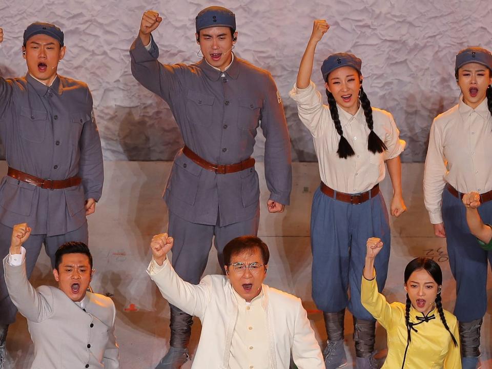 Jackie Chan performing with others in celebration of the founding of the Communist Party of China.