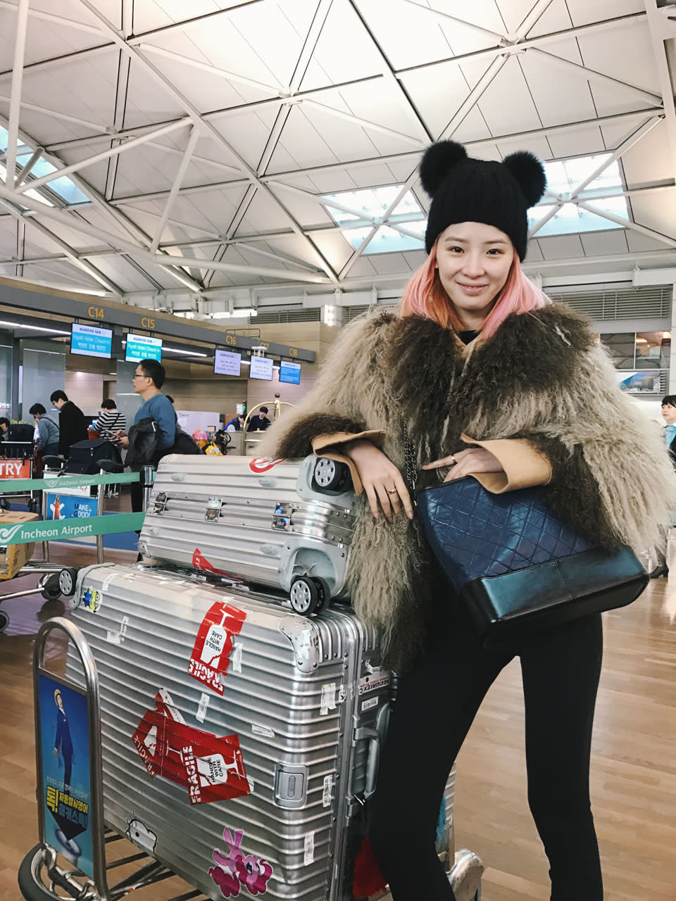 <p>Irene Kim with the Gabrielle Large Shopping Bag.<br> (Photo: Courtesy of Chanel) </p>