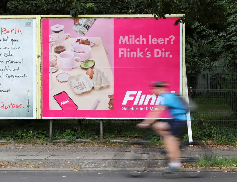 FILE PHOTO: Advertisements promoting delivery services in Berlin