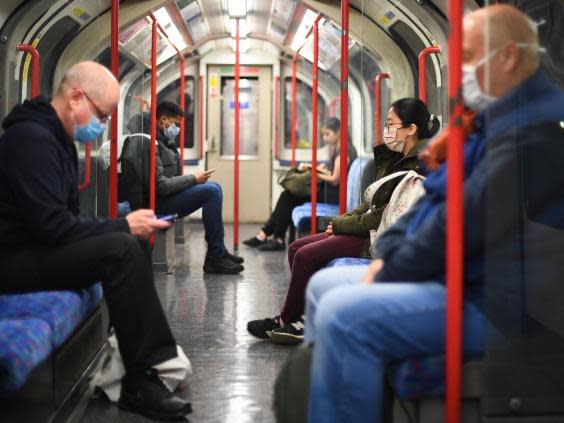 Public transport users must wear face coverings from 15 June (PA)