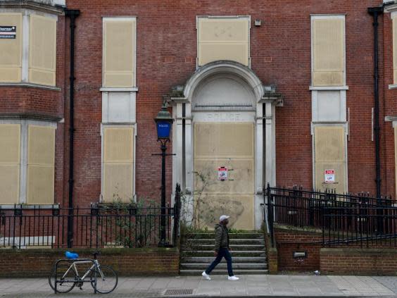 A boarded-up police station: hundreds of communities have been left without a base for officers (Getty)