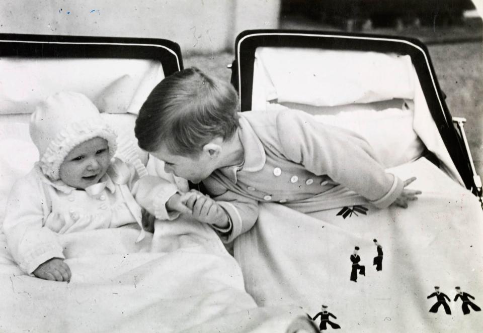 young charles and baby anne at at clarence house in july 1951
