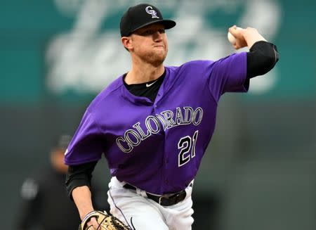 FILE PHOTO: Apr 18, 2019; Denver, CO, USA; Colorado Rockies starting pitcher Kyle Freeland (21) delivers a pitch in the first inning against the Philadelphia Phillies at Coors Field. Mandatory Credit: Ron Chenoy-USA TODAY Sports