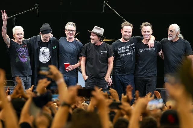 <p>Jim Bennett/Getty</p> Mike McCready (left), Josh Klinghoffer, Stone Gossard, Eddie Vedder, Jeff Ament, Matt Cameron and Boom Gaspar of Pearl Jam in Austin in September 2023