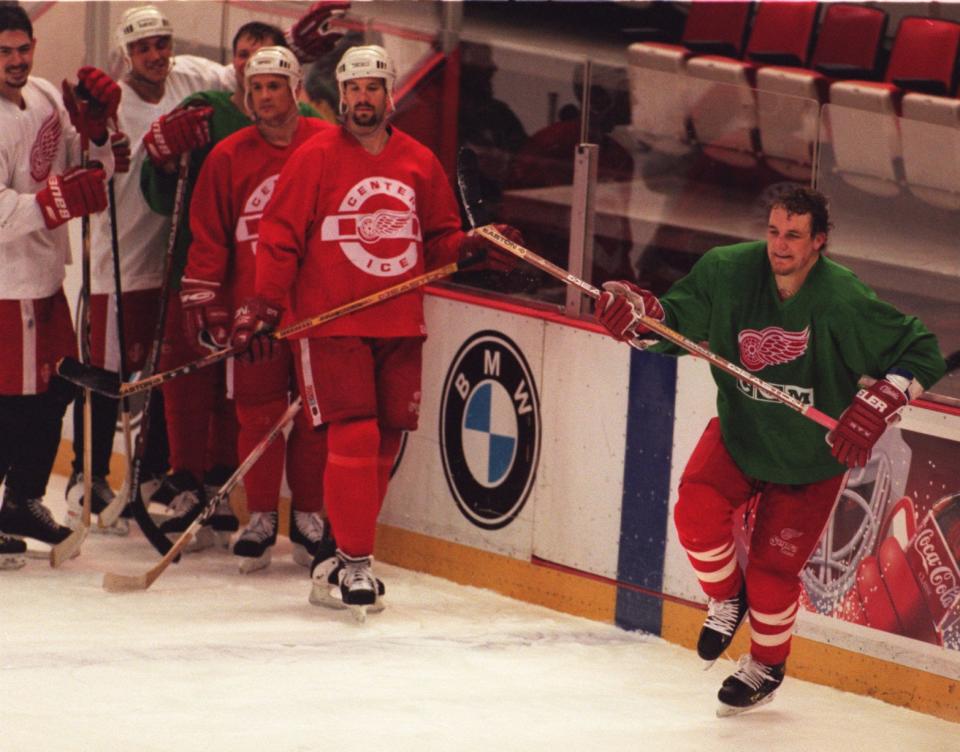 Detroit Red Wings practice at Joe Louis Arena, May 13, 1997, as they prepare to face the Colorado Avalanche in the playoffs in the Western Conference final. On the right is Darren McCarty, followed by Brendan Shanahan and Steve Yzerman.