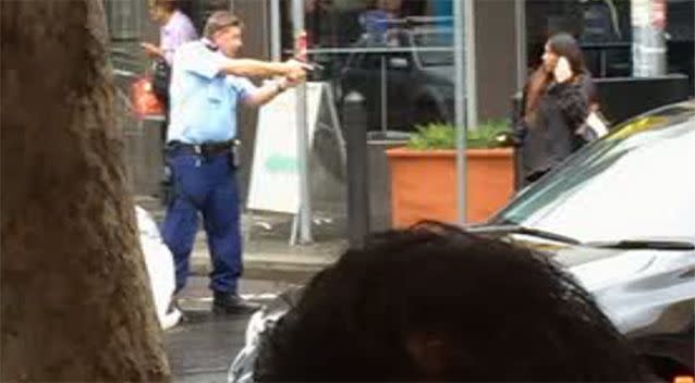 Witnesses said the woman was not threatening members of the public. Source: 7 News