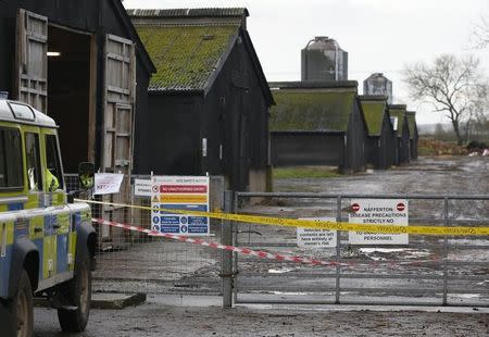 A police vehicle is seen at a duck farm in Nafferton, northern England November 17, 2014. REUTERS/Phil Noble