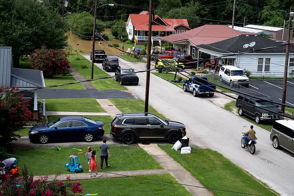 The North Fork Kentucky River is seen moving up Court Street on July 28, 2022, in Jackson, Kentucky.