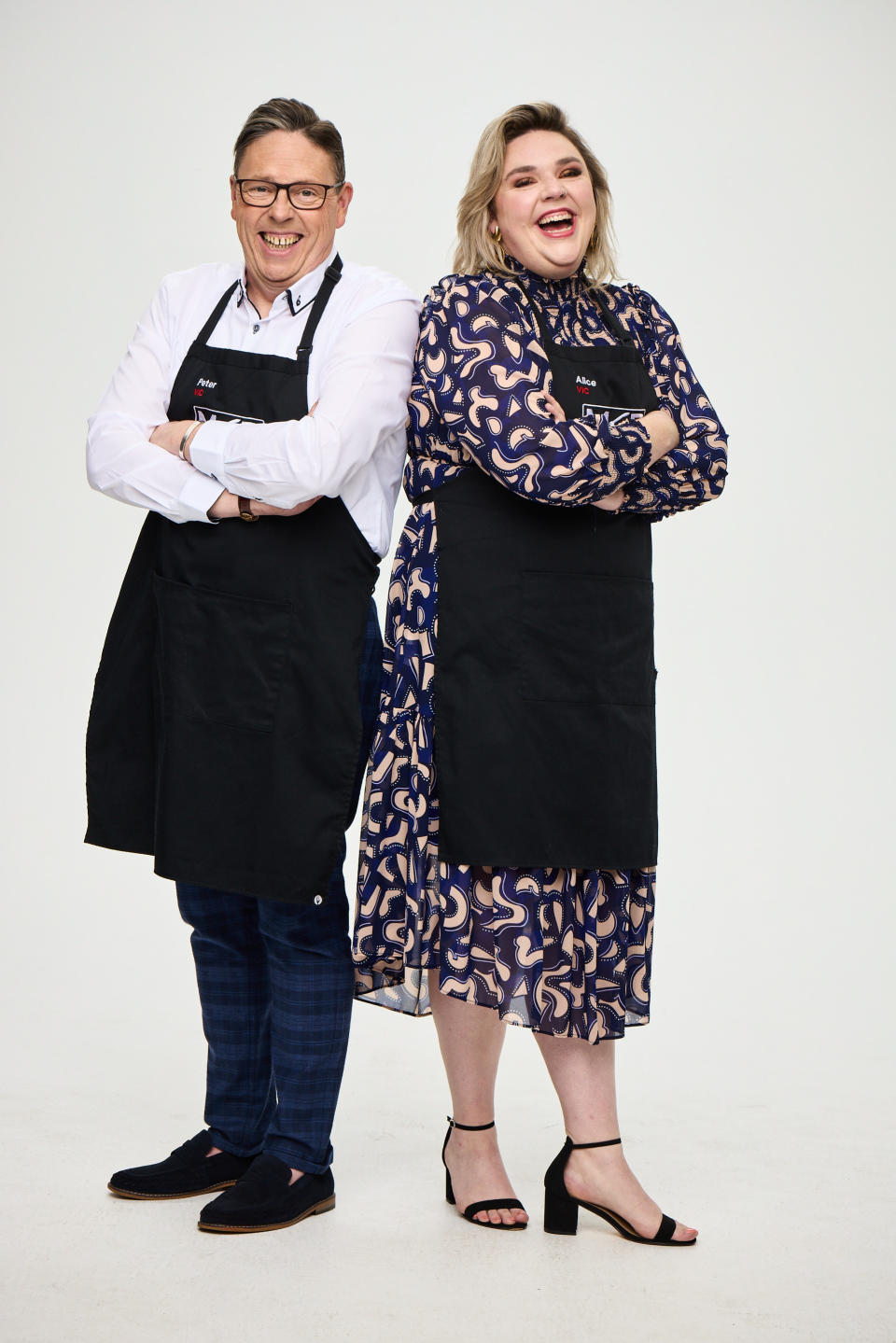 MKR 2022 father and daughter team Peter and Alice stand smiling in MKR aprons