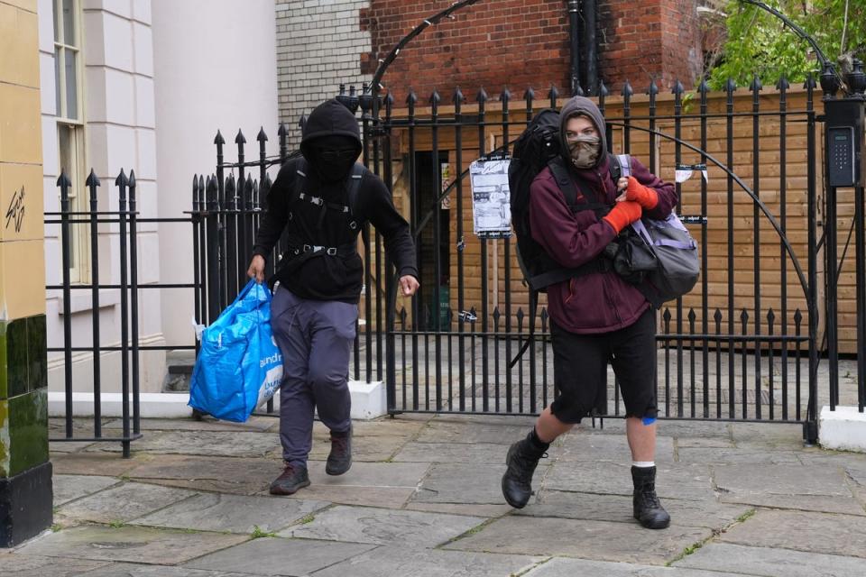 Squatters leaving the York & Albany pub near Regent’s Park (PA Wire)