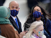 <p>Senator Cory Booker and his girlfriend, actress Rosario Dawson, wear matching masks to the inauguration on Wednesday. </p>