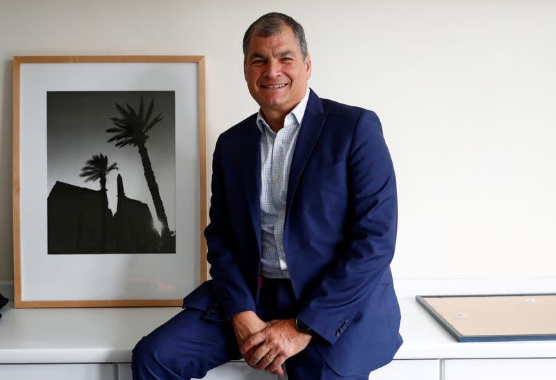 FILE PHOTO: Ecuador's former president Correa poses ahead of an interview with Reuters in Brussels