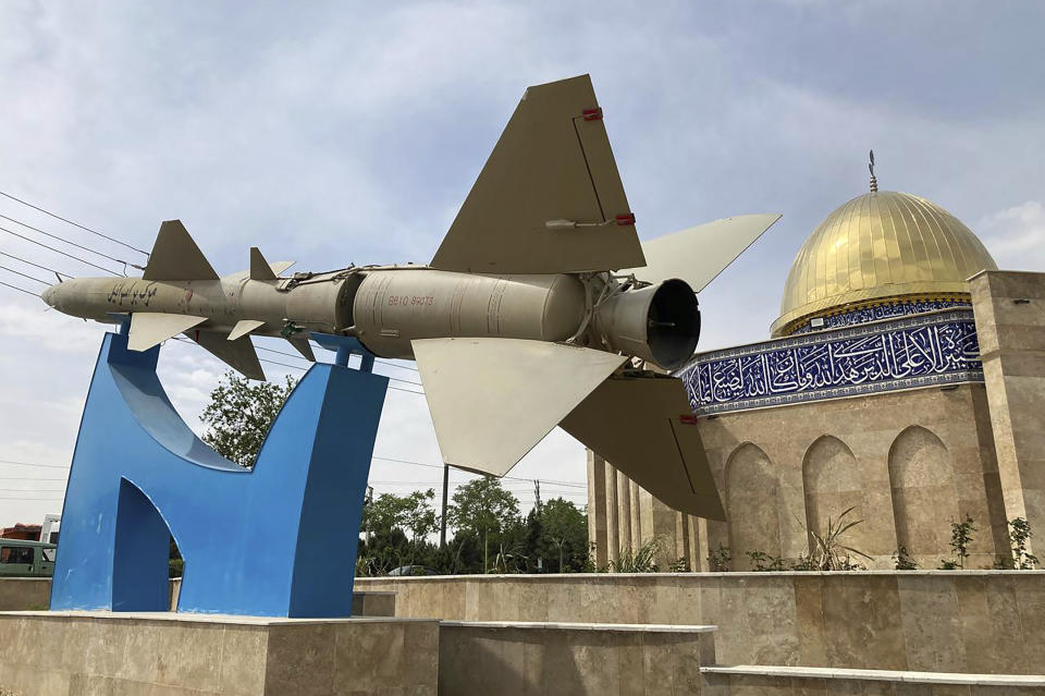 A missile is on display with a sign on it reading in Farsi: "Death to Israel" in front of a mosque in the shape of Dome of the Rock of Jerusalem at an entrance of the Quds town west of the capital Tehran, Iran, Sunday, April 21, 2024. Iran's supreme leader Ayatollah Khamenei on Sunday dismissed any discussion of whether Tehran's unprecedented drone-and-missile attack on Israel hit anything there, a tacit acknowledgment that despite launching a massive assault, few projectiles actually made through to their targets. (AP Photo/Vahid Salemi)