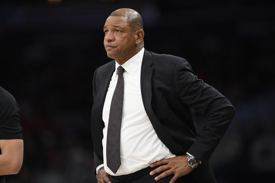 Los Angeles Clippers head coach Doc Rivers stands on the court during the first half of an NBA basketball game against the Washington Wizards, Sunday, Dec. 8, 2019, in Washington. (AP Photo/Nick Wass)