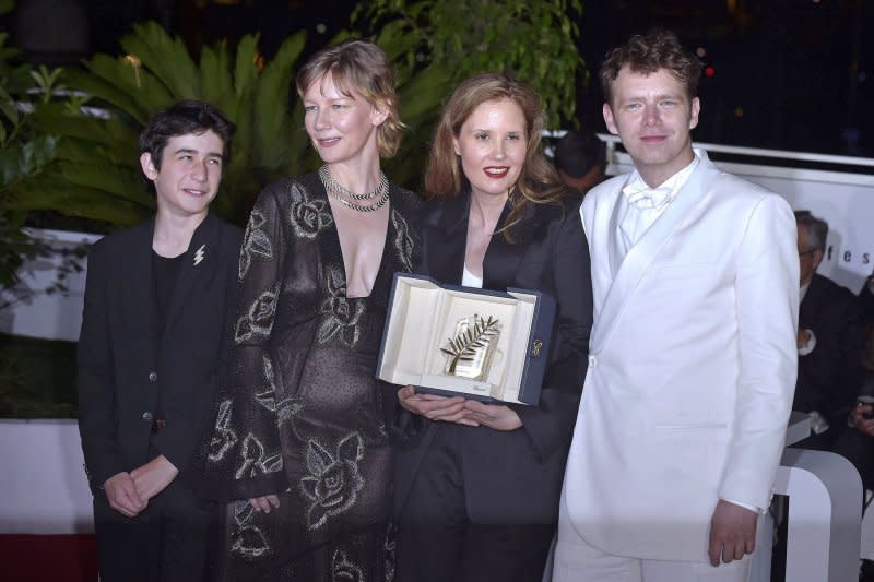 Left to right, Milo Machado Graner, Sandra Hüller, Director Justine Triet, and Antoine Reinartz pose with The Palme D'Or Award for "Anatomy of a Fall" during the Palme D'Or winners photocalat the 76th annual Cannes film festival at Palais des Festivals on May 27. File Photo by Rocco Spaziani/UPI