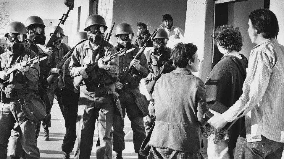 This May 8, 1970, photo shows the New Mexico Army National Guardsmen with unsheathed bayonets during an anti-war demonstration at the University of New Mexico in Albuquerque. - Albuquerque Journal via AP