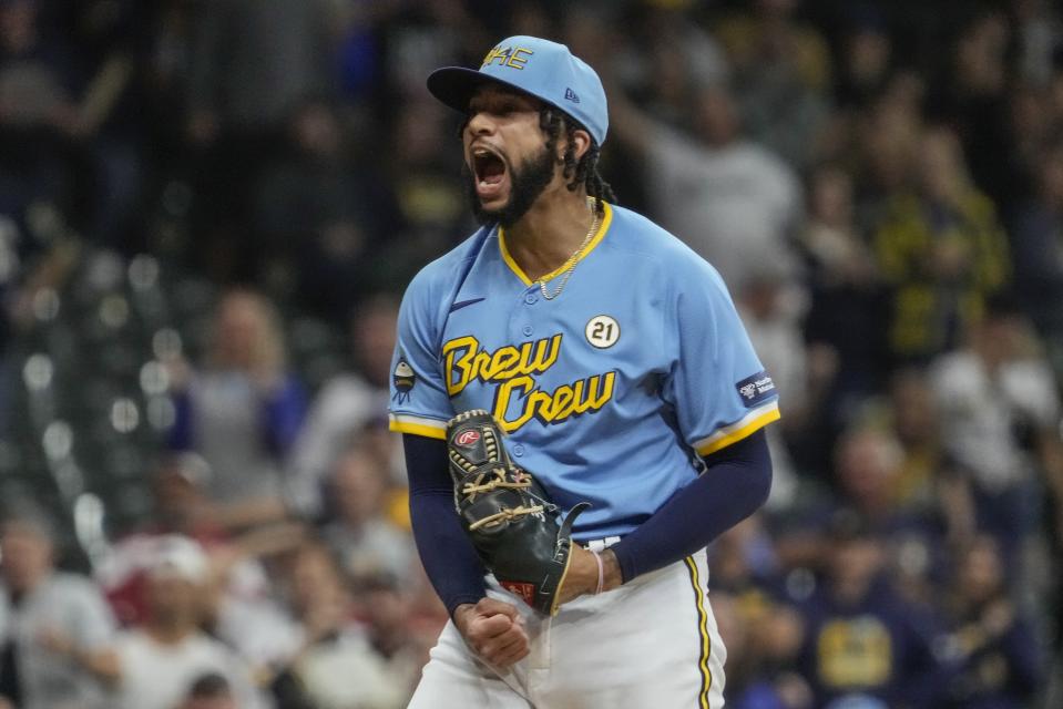 Milwaukee Brewers' Devin Williams reacts after getting Washington Nationals' Luis Garcia out to end the ninth inning of a baseball game Friday, Sept. 15, 2023, in Milwaukee. The Brewers won 5-3. (AP Photo/Morry Gash)