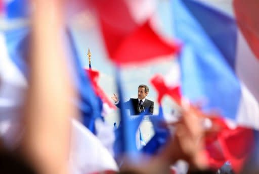 French President Nicolas Sarkozy delivers a speech during a campaign meeting at the Trocadero square in Paris. Sarkozy staged a huge election rally on Tuesday to rival France's traditional May Day show of force by the left, as Marine Le Pen scornfully rejected his bid to woo her far-right supporters